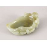 A GOOD 19TH / 20TH CENTURY CHINESE CARVED CELADON JADE BRUSH WASHER - LOTUS AND BOY, the brush