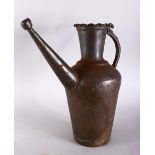 A GOOD 19TH CENTURY ISLAMIC BRONZE EWER, 33cm high x 32cm.