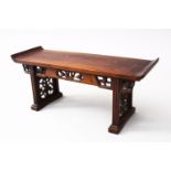 A GOOD EARLY 20TH CENTURY CHINESE HARDWOOD MINIATURE ALTER TABLE / STAND, with carved paron and