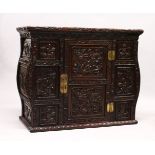 A GOOD 19TH CENTURY CHINESE CARVED HARDWOOD / HONGMU CABINET ON STAND, the cabinet with an opening