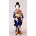 A GOOD 19TH CENTURY JAPANESE KUTANI PORCELAIN FIGURE OF A GEISHA GIRL, the body decorated with