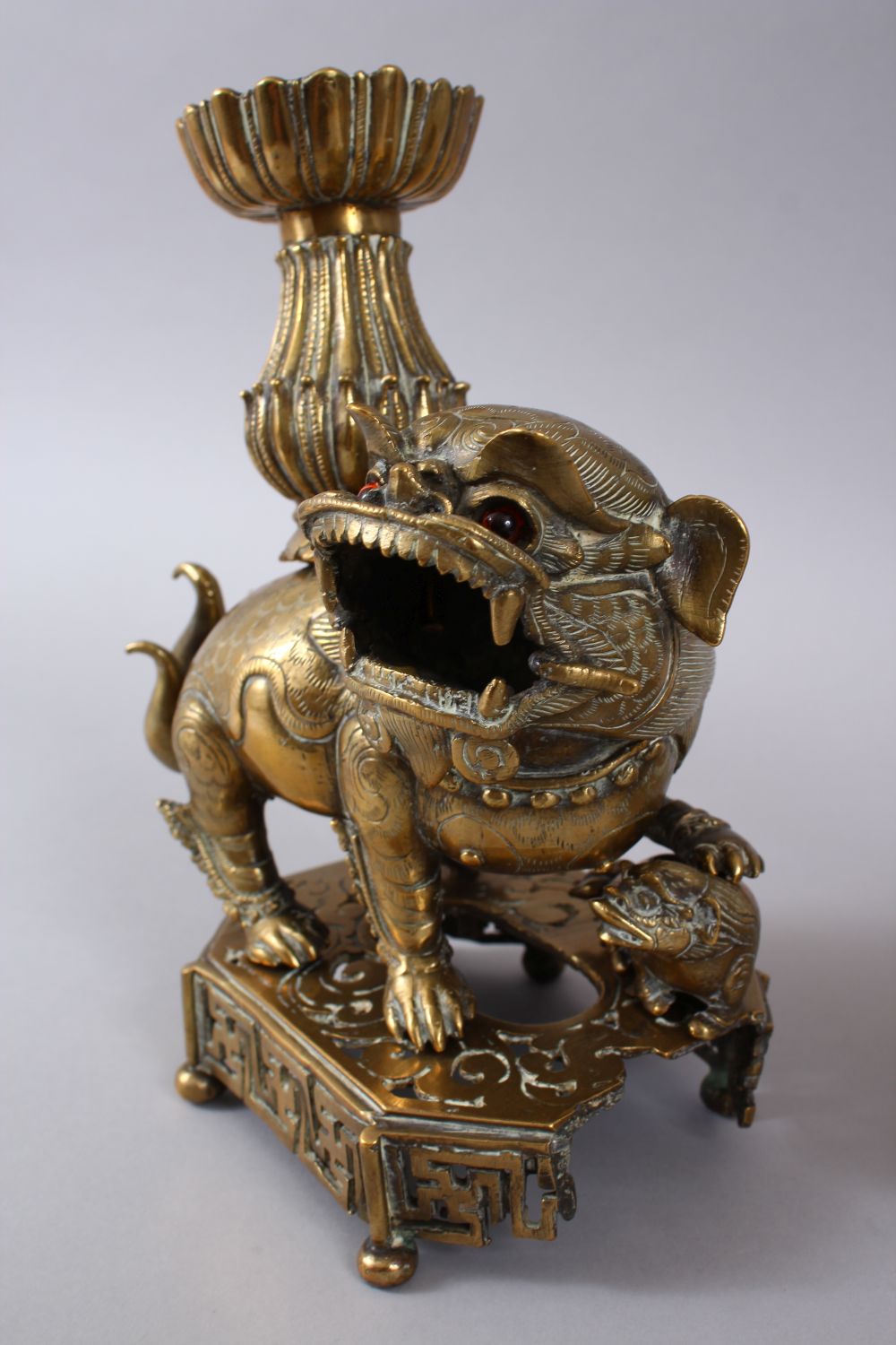 A PAIR OF 19TH / 20TH CENTURY CHINESE BRONZE CANDLESTICKS IN THE FORM OF LION DOGS, the pair of dogs - Image 4 of 11