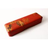 A GOOD JAPANESE MEIJI PERIOD RED LACQUER & GILT DECORATED LIDDED BOX, the box decorated with