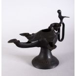 A GOOD POSSIBLY 13TH CENTURY ISLAMIC PERSIAN BRONZE CALLIGRAPHIC OIL LAMP, with three spouts and two