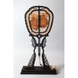 A VERY GOOD CHINESE EBONY, SANDLEWOOD AND IVORY DOUBLE SIDED FAN & STAND, the fan with pierced,