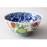 A GOOD CHINESE FAMMILE ROSE PORCELAIN BOWL, the interior with underglaze blue decoration of lotus,