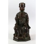 A GOOD CHINESE 19TH / 20TH CENTURY BRONZE FIGURE OF A SEATED EMPEROR, the bronze modeled seated with