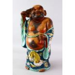 A LARGE 19TH / 20TH CENTURY CHINESE FAMILLE ROSE PORCELAIN FIGURE OF BUDDHA, stood with his belly