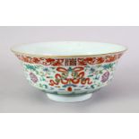 A GOOD 19TH CENTURY CHINESE FAMILLE ROSE PORCELAIN BOWL, the body decorated with Buddhist symbols