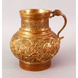 A GOOD 19TH CENTURY TURKISH OTTOMAN GILDED JUG, the body with carved floral decoration, 14.5cm