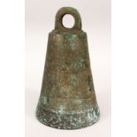 AN EARLY ISLAMIC BRONZE TEMPLE BELL/GONG, the lower section with carved calligraphy, 24cm high, 15cm