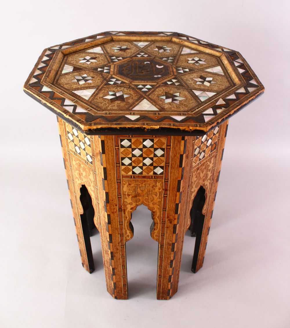 A FINE 19TH CENTURY TURKISH OTTOMAN MOTHER OF PEARL INLAID OCTAGONAL WOODEN TABLE, The top with