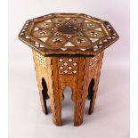 A FINE 19TH CENTURY TURKISH OTTOMAN MOTHER OF PEARL INLAID OCTAGONAL WOODEN TABLE, The top with