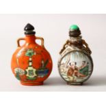 TWO 19TH / 20TH CENTURY CHINESE FAMILLE ROSE PORCELAIN SNUFF BOTTLES, one with a coral red ground