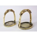 TWO 19TH CENTURY MONGOLIAN BRONZE STIRRUPS, 17CM HIGH & 16CM HIGH.