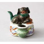 A GOOD 19TH CENTURY CHINESE FAMILLE ROSE PORCELAIN BRUSH WASHER - LION DOG, the brush wash with a