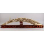 A VERY LARGE AND FINE 19TH CENTURY CHINESE CARVED IVORY BRIDGE GROUP, the bridge group carved to