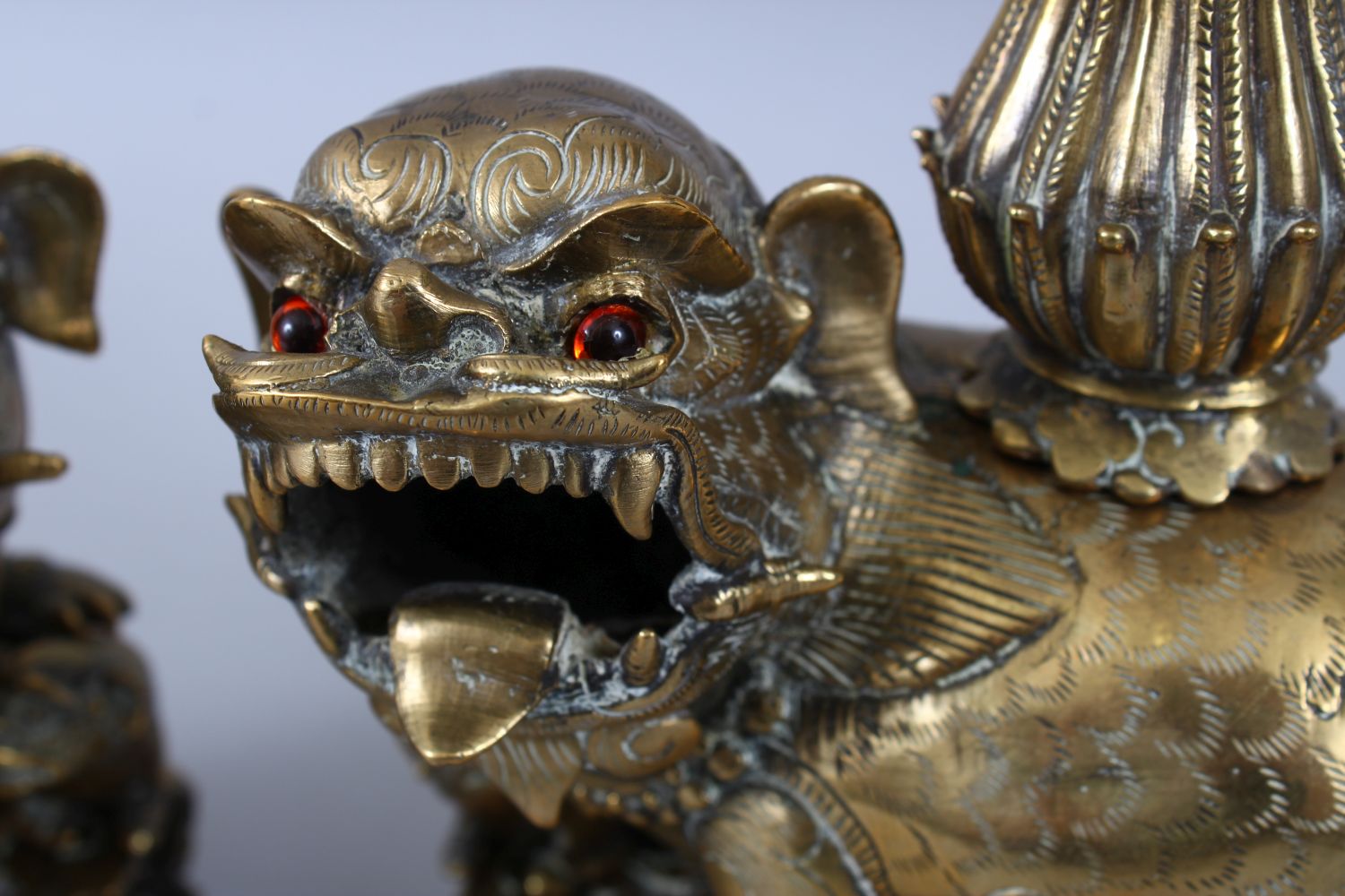 A PAIR OF 19TH / 20TH CENTURY CHINESE BRONZE CANDLESTICKS IN THE FORM OF LION DOGS, the pair of dogs - Image 3 of 11