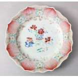 A GOOD CHINESE 18TH CENTURY FAMILLE ROSE PORCELAIN LOBED PLATE, the dish with panel enamel