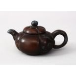 A GOOD QUALITY CHINESE YIXING CLAY MINIATURE TEA POT & COVER, moulded in the form of a pumpkin,