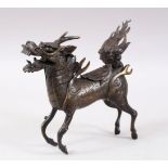 A GOOD CHINESE MING DYNASTY STYLE BRONZE QILIN INSENCE BURNER, stood in a striding pose with its