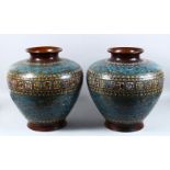 A PAIR OF 19TH CENTURY OR EARLIER CHINESE CLOISONNE POTS, the pots decorated with a band of