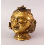 A GOOD INDIAN BRONZE FIGURE OF A GODDESS HEAD, 13cm high.