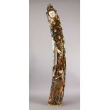 A LARGE AND IMPOSING 19TH CENTURY CHINESE POLYCHROME DECORATED CARVED IVORY TUSK FIGURE OF