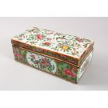 A GOOD 19TH CENTURY CHINESE CANTON FAMILLE ROSE PORCELAIN BOX & COVER, the body decorated with panel
