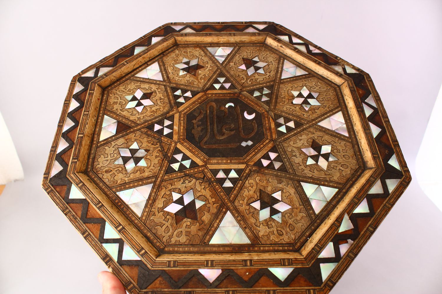 A FINE 19TH CENTURY TURKISH OTTOMAN MOTHER OF PEARL INLAID OCTAGONAL WOODEN TABLE, The top with - Image 2 of 6