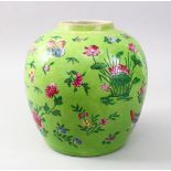 A GOOD CHINESE QIANLONG APPLE GREEN GROUND FAMMILE ROSE PORCELAIN JAR, the green ground decorated