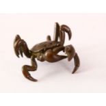A JAPANESE BRONZE FIGURE OF A CRAB, signed underside, 6cm.