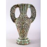 A 19TH CENTURY ISLAMIC SPANISH ALHAMBRA POTTERY VASE, with moulded floral motif decoration and