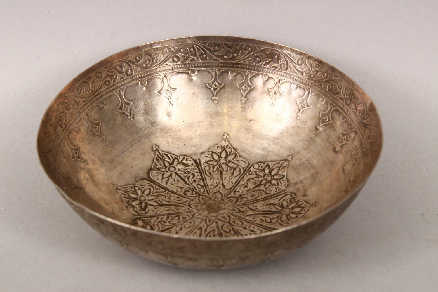AN 19TH CENTURY ISLAMIC MALAYSIAN SILVER BOWL, the exterior engraved with scrolling foliate - Image 2 of 3