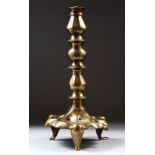 A 13TH CENTURY SELJUK KORASHAN PERSIAN ISLAMIC COPPER INLAID BRASS OIL LAMP STAND, with carved