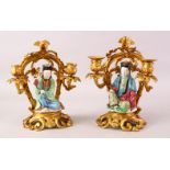 A GOOD PAIR OF 19TH CENTURY FAMILLE ROSE PORCELAIN FIGURES OF GUANYIN ON ORMOLU MOUNTED