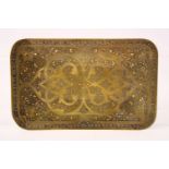 A VERY FINE ISLAMIC SILVER AND GOLD INLAID BRASS TRAY, 19.5cm x 12.5cm.