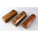 THREE FINE 19TH CENTURY INDIAN KASHMIRI LACQUERED PAPIER-MACHE PEN BOXES, each decorated with
