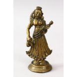 A GOOD 19TH CENTURY OR EARLIER INDIAN BRONZE FIGURE OF A GODDESS HOLDING A CHILD, 13.5cm high.