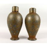 A GOOD PAIR OF 19TH CENTURY OR EARLIER ISLAMIC KASHMIR LACQUER DECORATED VASES & COVERS, the body of