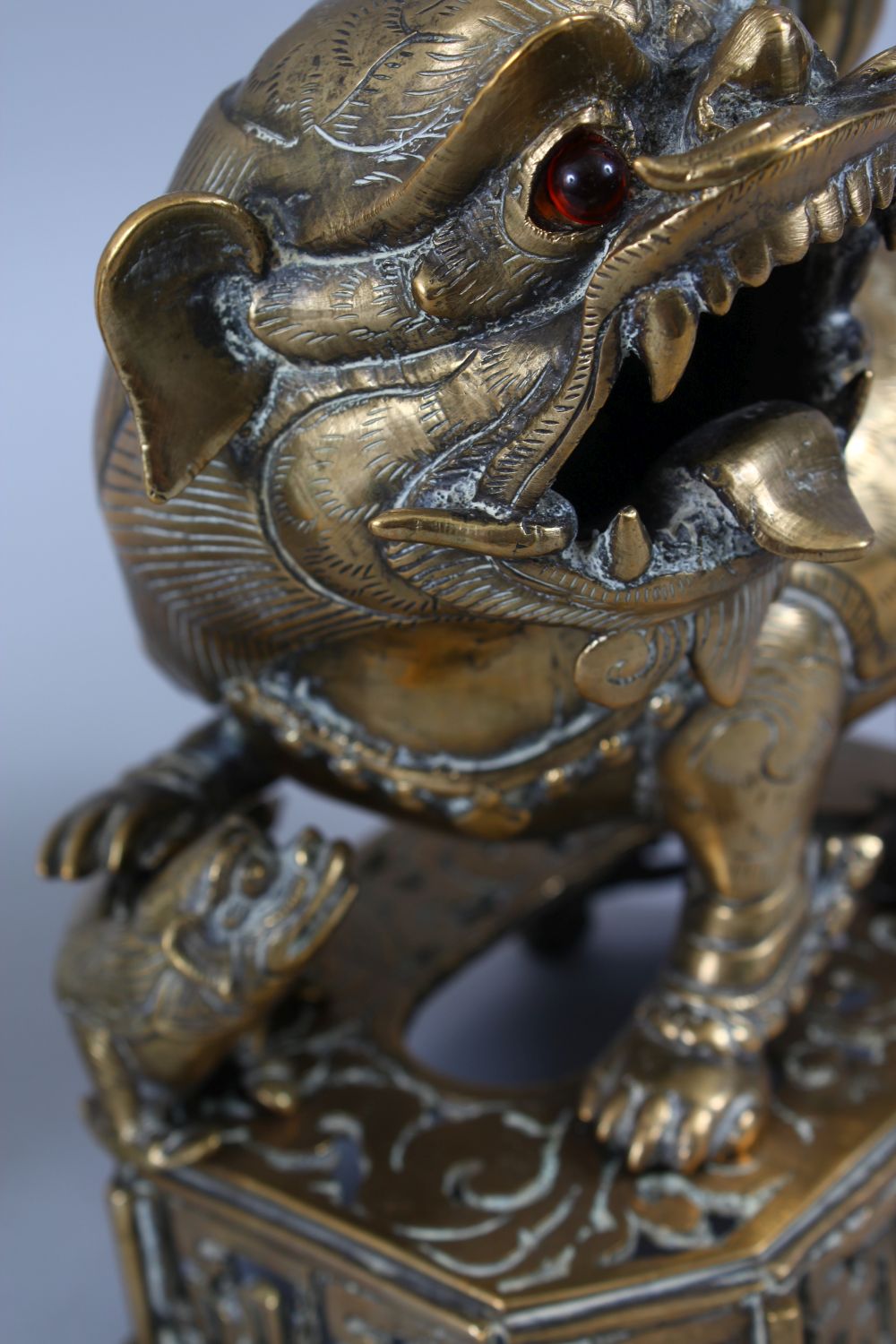 A PAIR OF 19TH / 20TH CENTURY CHINESE BRONZE CANDLESTICKS IN THE FORM OF LION DOGS, the pair of dogs - Image 6 of 11