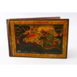 A 19TH CENTURY PERSIAN QAJAR LACQUERED BOOK BINDING, the binding decorated with scenes of a figure