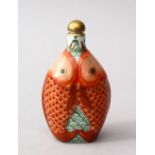 A GOOD 19TH CENTURY CHINESE FAMILLE ROSE PORCELAIN FISH SNUFF BOTTLE, the moulded body of the