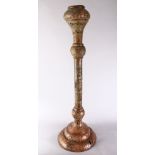 A LARGE 19TH CENTURY ISLAMIC CALLIGRAPHIC AND OPENWORK CANDLESTICK, finely decorated in Arabic