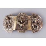 A GOOD BURMESE WHITE METAL EMBOSSED THREE PIECE BELT BUCKLE, Embossed with figures and animals,