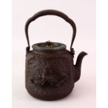 A GOOD JAPANESE EDO / MEIJI PERIOD IRON SAKE POT / TEA POT & COVER, the hammered effect ground