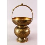 A GOOD INDIAN BRASS CHASED DECORATED SPITTOON, with scrolling floral design, 30cm high x 17cm wide.