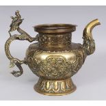 A 19TH CENTURY TIBETAN BRASS OR BRONZE ALLOY EWER, with copper rivet pins, the sides with embossed
