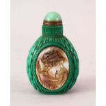 A GOOD QUALITY CHINESE PEKING GREEN GLASS & MOTHER OF PEARL SNUFF BOTTLE, the glass moulded to