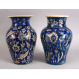 TWO GOOD 20TH CENTURY PALESTINIAN POTTERY VASES, both decorated in a similar manner with a deep blue